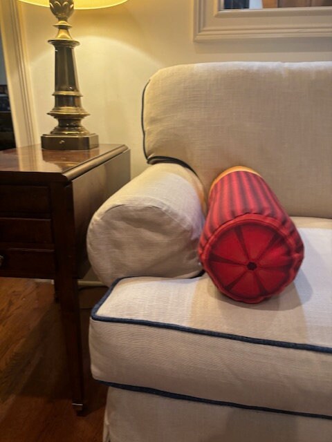 Red Shotgun shell pillow. Shaped like a real shotgun shell. Great gift for any hunter